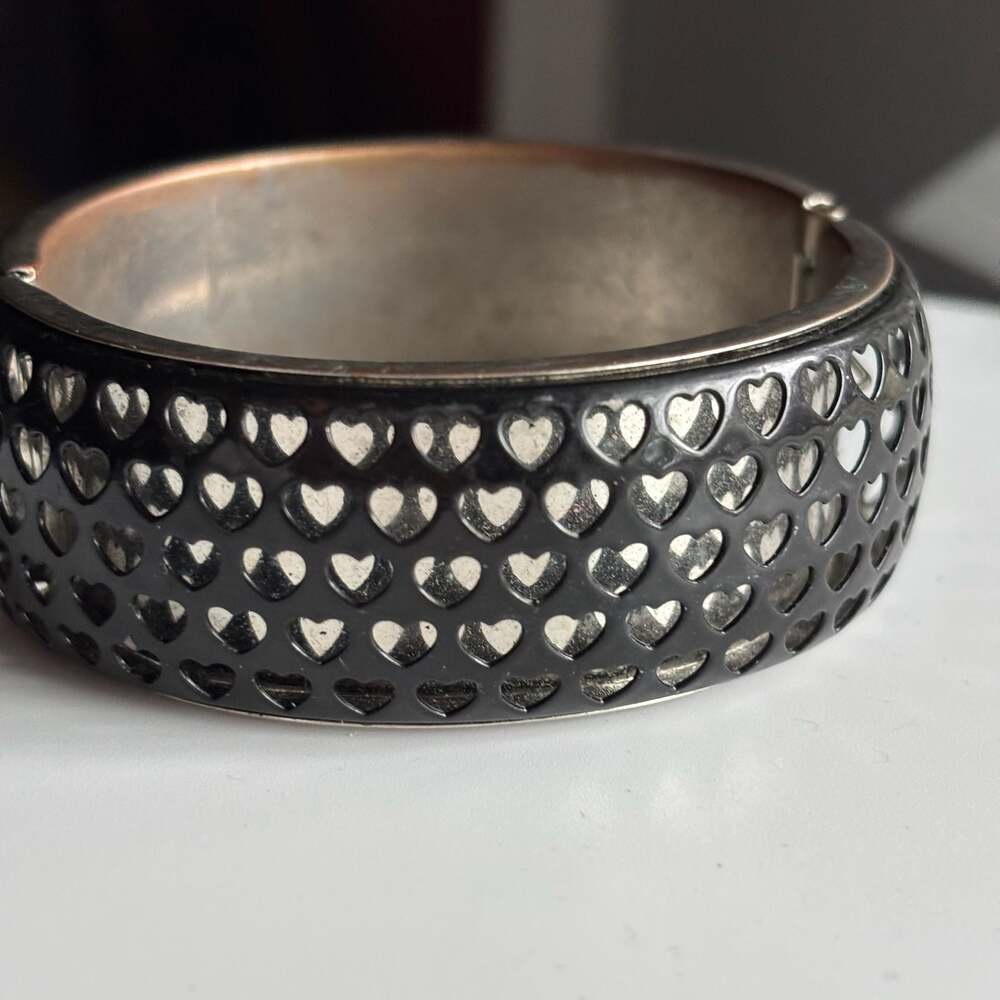 Silvertone Black Heart Perforated Hinged Bangle Bracelet